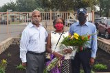 Left to right are Chris Tolbert, Nancy Tolbert and Otis Tolbert Sr. They are standing in front of the newly remodeled memorial for their son, Otis Tolbert, who died on Sept. 11, 2001 in the Pentagon.